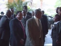 Mugabe arriving for talks with Morgan and Mbeki News Clip