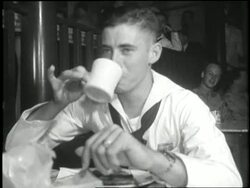 Women visit with soldiers in the canteen. News Clip