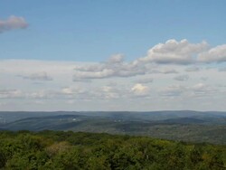 clouds over foothills Stock Footage