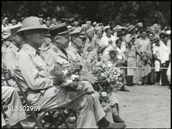 1943: NATIVE MELANESIAN DANCE: VS Native indigenous Melanesian (unconfirmed) performing traditional tribal dance (SOT), various officers, generals, soldiers watching dance. WWII, World War II, Pacific Front, entertainment Instructional Video