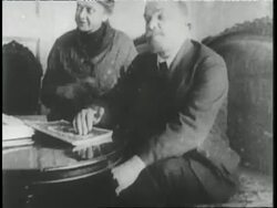 Communist leader Vladimir Lenin sits with his wife, Nadezhda Krupskaya, and their cat. News Clip