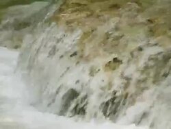 CU SLO MO Shot of water flowing quickly / Kuang Si, Luang Prabang, Laos Stock Footage