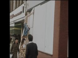 UPITN 28 4 79 SHOPS AND BANKS BOARDED UP BEFORE MARCH IN MOURNING OF BLAIR PEACH News Clip
