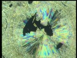 Zoom in to colourful crystals, concentric circle pattern Stock Footage