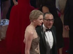 Taylor Swift and Gilles Mendel at the 'Alexander McQueen: Savage Beauty' Costume Institute Gala At The Metropolitan Museum Of Art at New York NY. Stock Footage