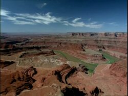 High WA Colorado river in canyon lands, river meanders through landscape, Utah, USA Stock Footage