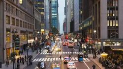 Pedestrians maneuver across a crosswalk on 42nd Street in New York City. Stock Footage