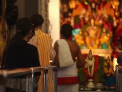 WS Worshipping and Offerings and praying at Indian Hindhi temple Stock Footage