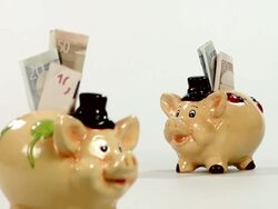 MS R/F Shot of Piggybanks with Euro / Saarburg, Rhineland Palatinate, Germany Stock Footage