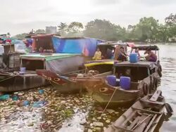 MS T/L PAN Shot of Ho Chi Minh City floating market / Ho Chi Minh City, Southeastern, Vietnam Stock Footage
