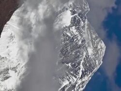 Vertical shot of Time-lapse of clouds swirling around Mount Everest. Stock Footage