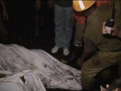 AP pix of fire that killed up to 108 people and injured 100 more News Clip