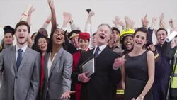 Diverse crowd with different careers raising arms cheering Stock Footage