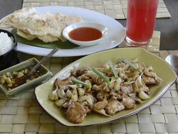 MS View of Fried chicken with garlic, pepper and rice / Nyaungshwe, Inle Lake, Shan State, Myanmar Stock Footage