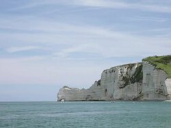 Etretat right Cliff and church LV - HD Stock Footage