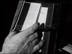 1947: STANDARD OIL (INDIANA): PERSONNEL & SAFETY DEPARTMENT: Representative talking w/ employee at desk, SOT explaining benefits, sickness & retirement plan. Instructional Video