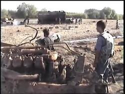 WRAP Wounded, German troops, McChrystal at scene of airstrike, intv Instructional Video