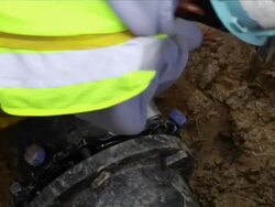 Construction Workers Install Water Main Stock Footage