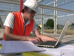 Building Contractor under construction site Stock Footage