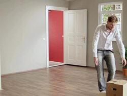 WS Three people moving boxes out of house / Berlin, Germany Stock Footage