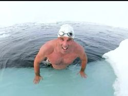 Man swims at North Pole News Clip