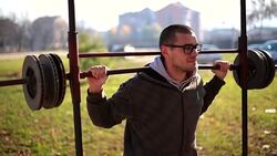 Young fit athlete man doing Strict Press Stock Footage