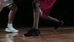 SLO MO of player dribbling the ball against the opponent Stock Footage