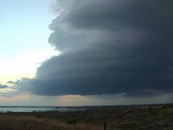 WS T/L View of beautiful striated supercell thunderstorm spinning over Lake Kemp / Lake Kemp, Texas, United States Stock Footage