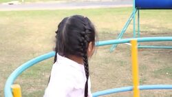 Girl is playing at amusement park Stock Footage