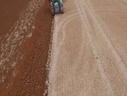 Aerial view of Tractor Ploughing Stock Footage