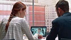 Two architects on video call with their project manager Stock Footage