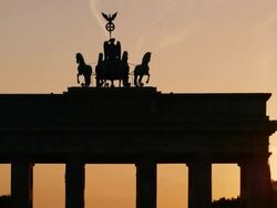 PAN Berlin Brandenburg Gate At Sunset (4K/UHD to HD) Stock Footage