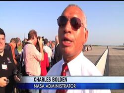 The space shuttle Atlantis and four astronauts returned from the international space station in triumph Thursday, bringing an end to NASA's 30-year shuttle journey with a "wheels stop" Thursday morning. News Clip