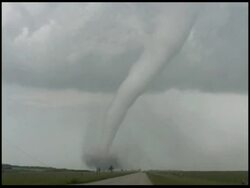 WA Tornado moving over countryside, Storm chasers car drives towards it, USA Stock Footage
