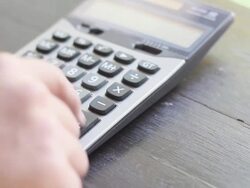 Businessman using a calculator Stock Footage