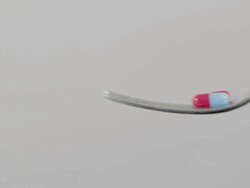 Pills on a fork Stock Footage
