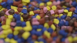 Polymer granules slow motion Stock Footage