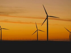 HD wind farm at sunset Stock Footage