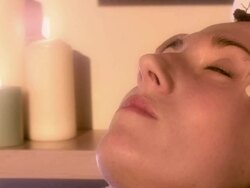Woman having face massage Stock Footage