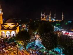 High view on Sultanahmet park and the Blue Mosque at night during Ramadan tilt Stock Footage