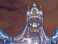 HD Motion Time-Lapse: Busy Tower Bridge At Night Stock Footage