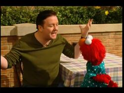 Ricky Gervais and Elmo team up on 'Sesame Street' News Clip