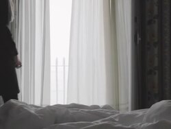 HD DOLLY: Woman Walks On Bedroom's Balcony Stock Footage