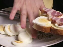 Egg and bacon sandwich Stock Footage