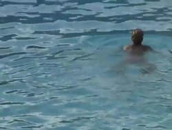 (HD1080i) Swimming Out of Frame Stock Footage