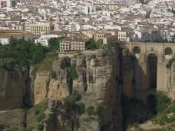 Aerial view of city with bullring and Tajo Bridge, Ronda, Andalusia, Spain Stock Footage