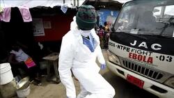 CLEAN : Monrovia Red Cross retrieve body of possible Ebola victim News Clip