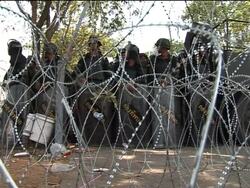 WRAP Anti-govt protesters storm telecom company News Clip