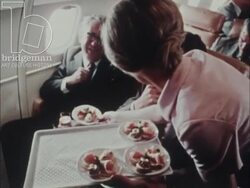 Supersonic Preview part 3 - British Airways Concorde takes off. Interior cockpit with pilots. Interior cabin with passengers being served food. c.1976 Stock Footage