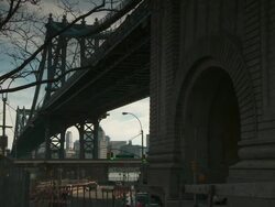 A view directly beside the Manhattan Bridge looking toward the FDR overpass and Brooklyn Stock Footage